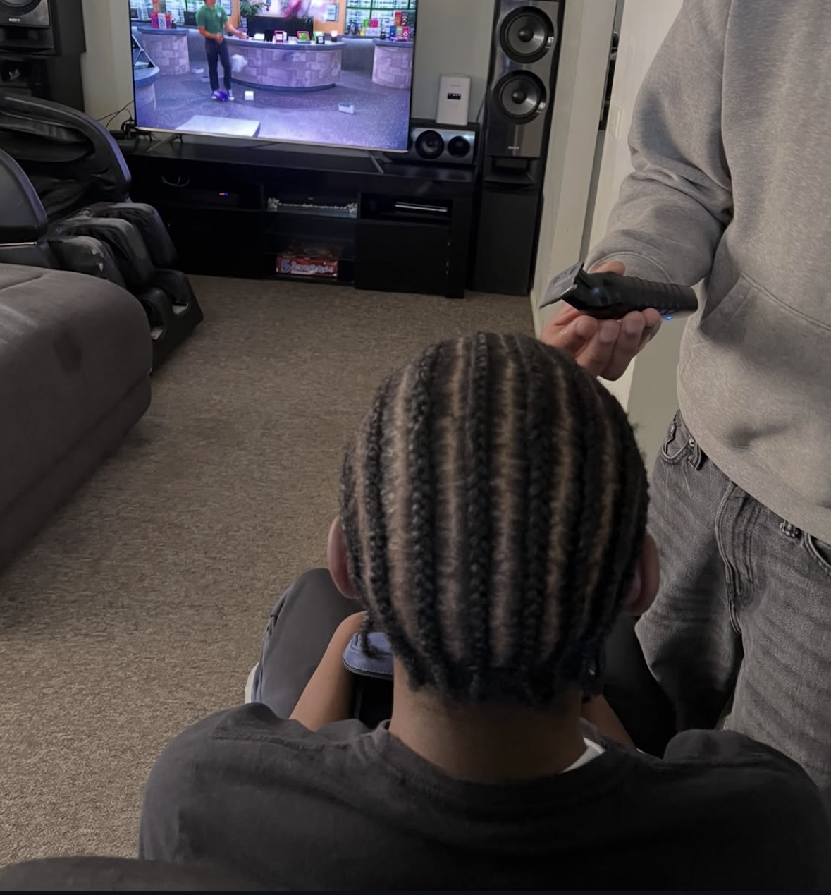 Braids and hairstyle by Hair Done by Layy