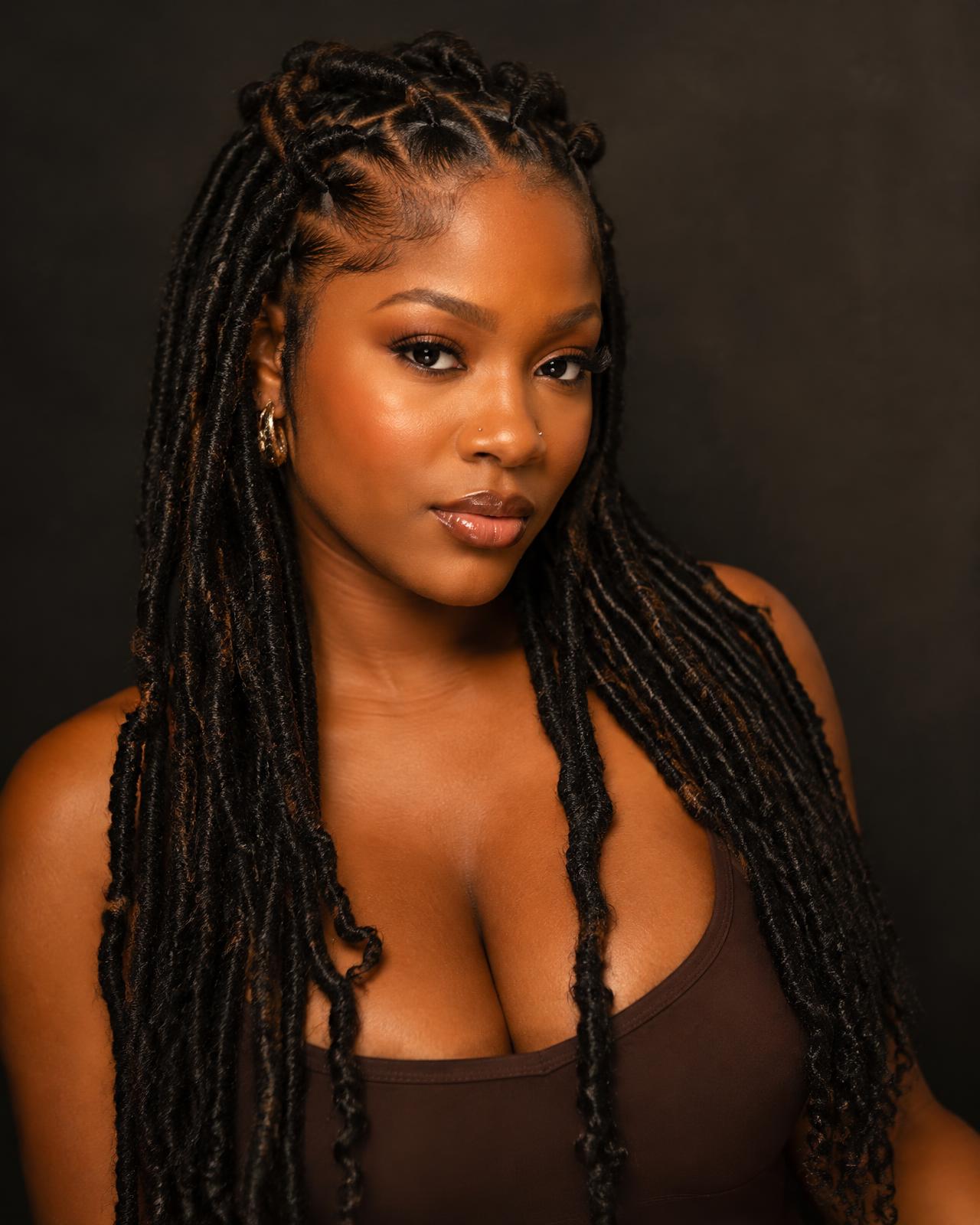 Freshly retwisted and styled locs